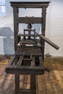 18th century wooden printing press with metal screw for relief printing using Blaeu mechanism