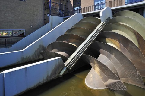 Modern Archimedes screws of pumping station used to drain the polders at Kinderdijk in Holland