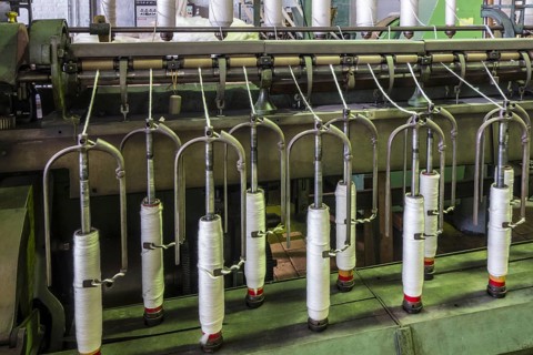 Roving frame machine for drafting the sliver into roving by twisting fibers in cotton mill