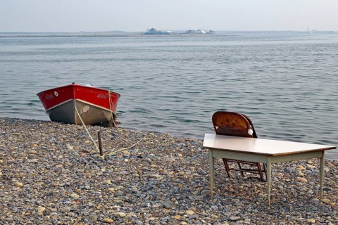Small boat and table on Tuktojaktuk beach