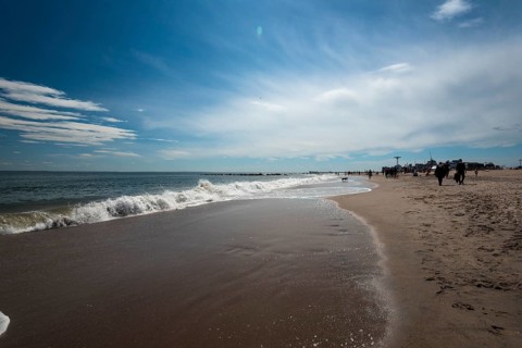 Listening to the ocean waves on a sunny spring day on the Brighton Beach
