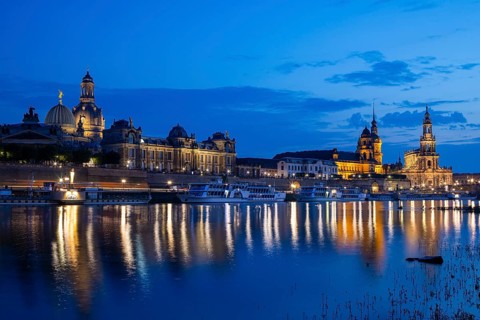 Silhouette of Dresden's Old Town in the evening on the Elbe