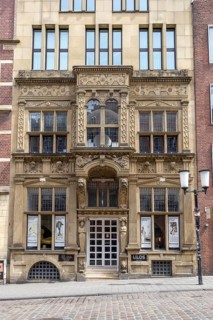 Beautiful facade with entrance portal in neo-baroque style in the street Drubbel