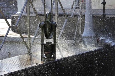 Water pouring down from caisson of hydraulic boat lift on the old Canal du Centre at Houdeng-Goegnies near La Louviere in the Sillon industriel of Wallonia