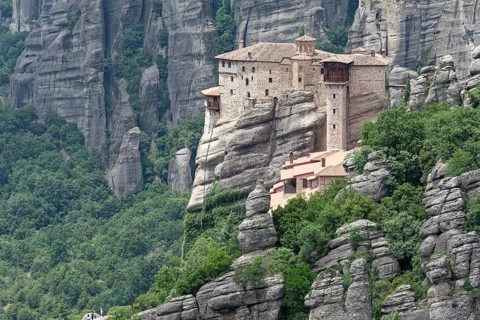 The Meteora Monastery Roussanou. The Greek Orthodox Meteora monasteries are built on sandstone cliffs. They are a UNESCO World Heritage Site. Kalambaka