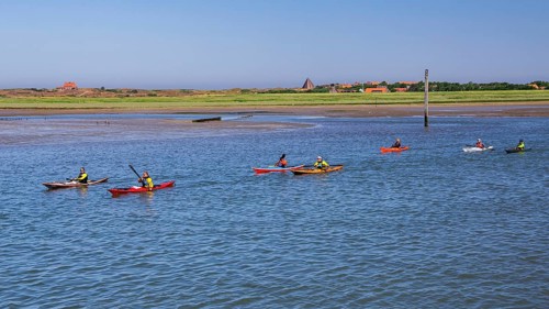 Kayakers in front of the island