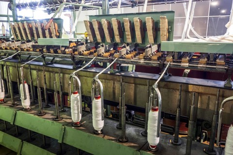 Roving frame machine for drafting the sliver into roving by twisting fibers in cotton mill
