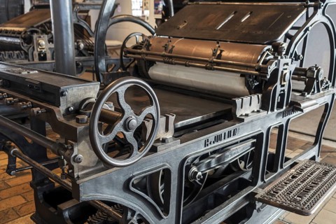 Late 19th century cast iron stop-cylinder press driven by steam engine made by H. Jullien