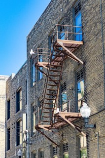Fire escape in the historic Exchange District on a typical brick facade from around 1915