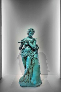 Flute player as kiln crown