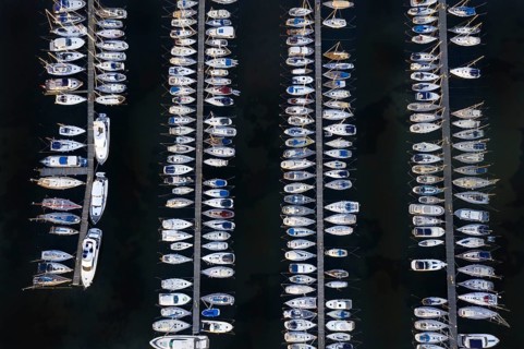 Aerial view over jetties with sailing boats at marina in harbour of Heiligenhafen along the Baltic Sea