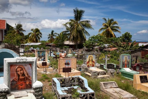Old Christian cemetery with images of saints