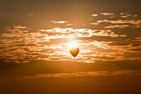 Hot air balloons in the cloudy sky