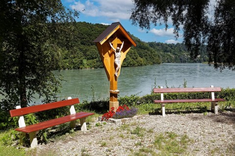 Wooden cross with Christ and roof