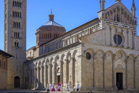 Priest on his way to Mass in the Cathedral di San Cerbone