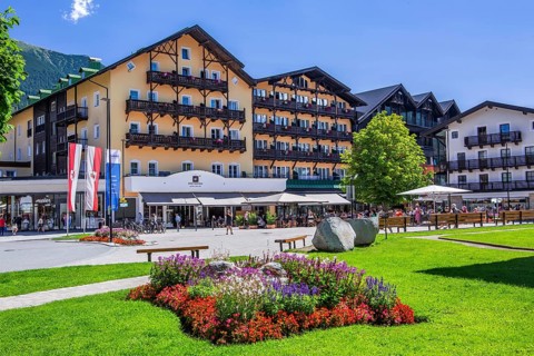 Flower border on the village square with hotels