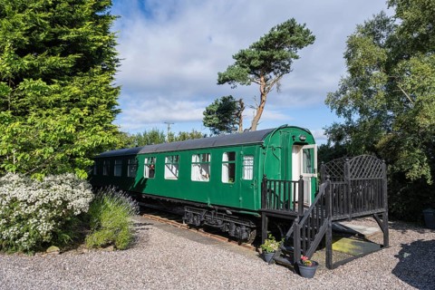 Old railway carriage converted into a stationary hostel