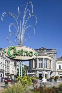 Park and sign in front of the Casino de Spa and brasserie in summer in the city Spa