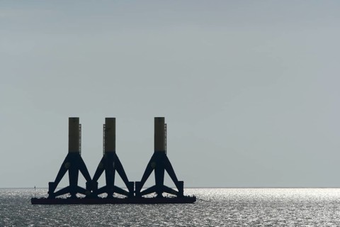 Foundations of offshore wind turbines in tow in the Weser fairway off Minsener Oog