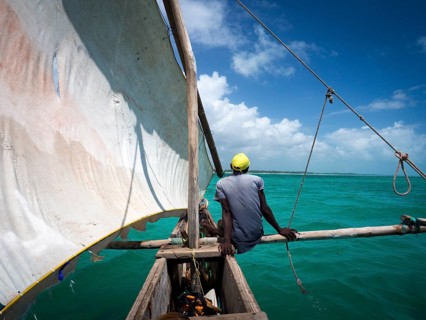 Local on outrigger boat