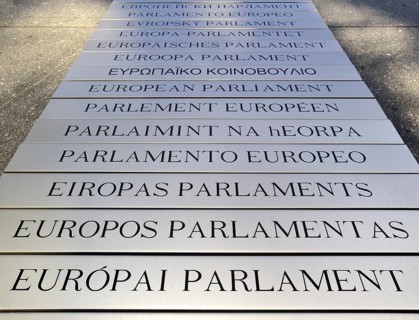 Nameplates of the European Parliament written in different European languages in the Leopold Quarter