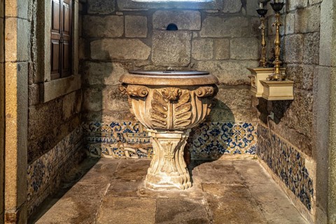 Baptismal font in the church Igreja de Nossa Senhora da Oliveira