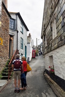 Pedestrians in a narrow alley