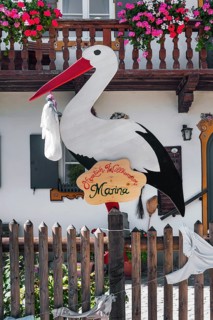 Stork figure with birth announcement