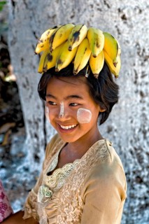 Girl with bananas on her head