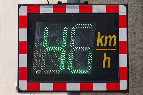 Speed indicator on a road