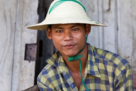 Young man with rice hat
