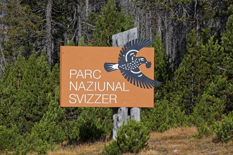 Sign showing logo of the Swiss National Park at Graubuenden