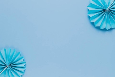 Blue origami paper fan corner blue backdrop