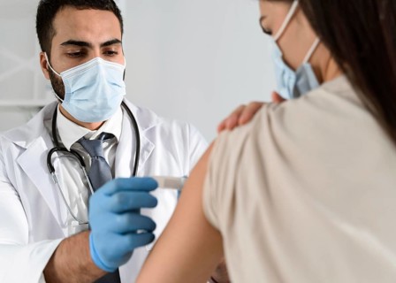 Man putting bandage patient s arm