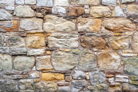Wall stones made of different types of stone