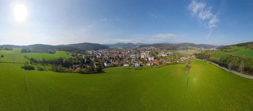 Drone shot over the Kremesberg to the town