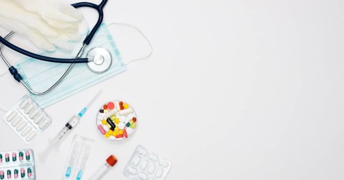 Top view stethoscope with syringe pills