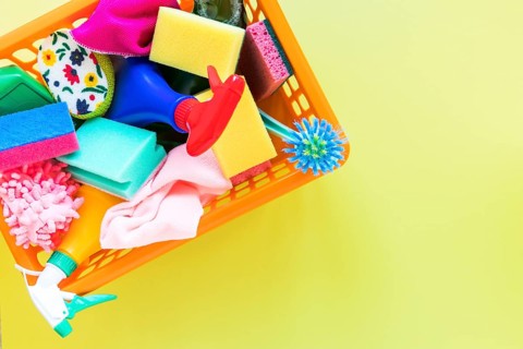 Top view frame with basket with cleaning products
