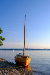 Small sailboat on the shore