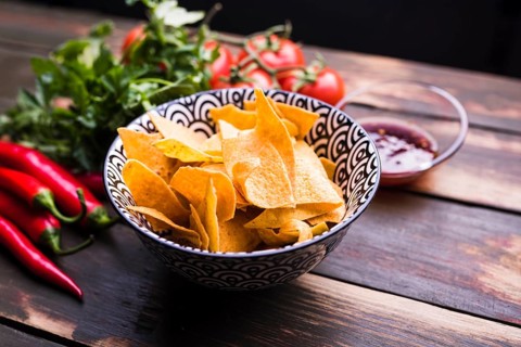 Flat lay nachos vegetables ketchup
