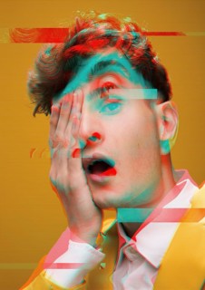 Close up portrait man making funny faces glitch effect