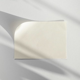White background with white blank paper with its shadow