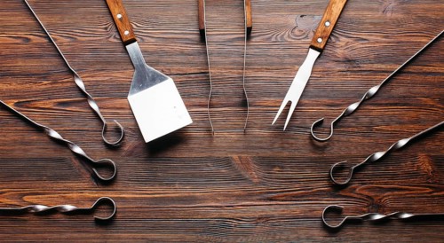 Barbecue utensil set wooden table