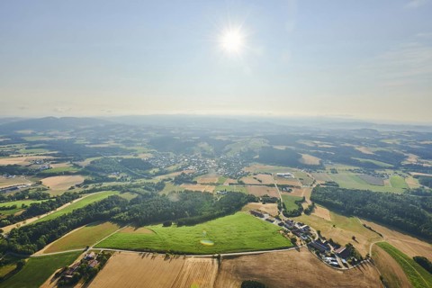 Aerial view over the fields and forests near Woerth an der Donau