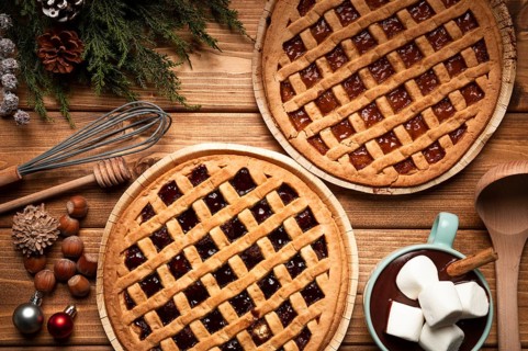Top view christmas pie with hot chocolate