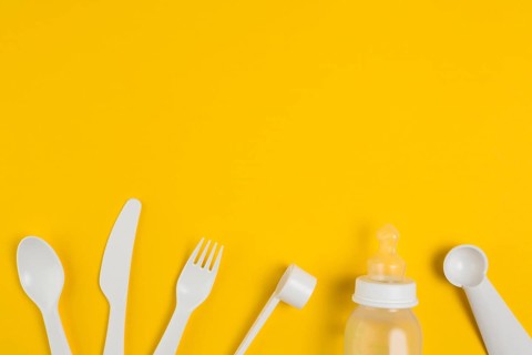 Top view plastic cutlery baby bottle baby shower
