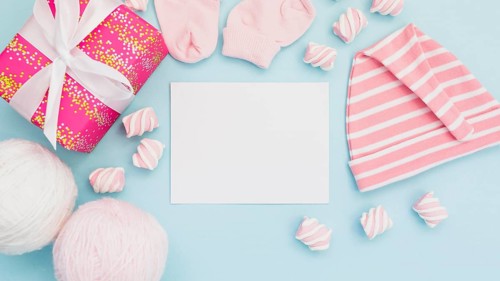Arrangement baby clothes postcard