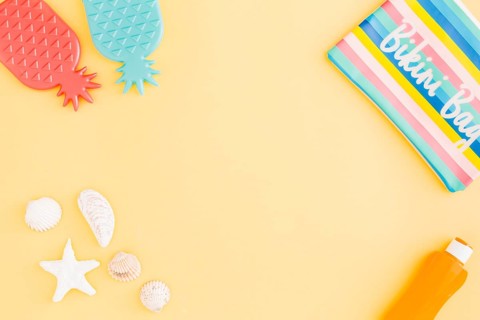 Set summer beach holiday accessories yellow background