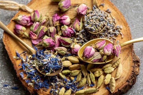Top view assortment spices wooden board