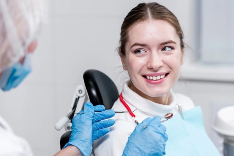 Portrait young woman dentist